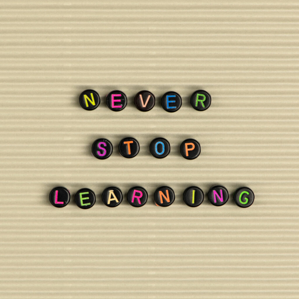 NEVER STOP LEARNING beads message typography